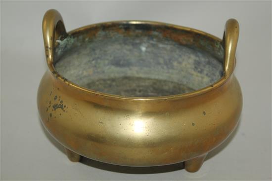 A large Chinese bronze tripod censer, Ding, Xuande six character mark, probably 18th / 19th century, diam. 20.5cm, weight 2030g.